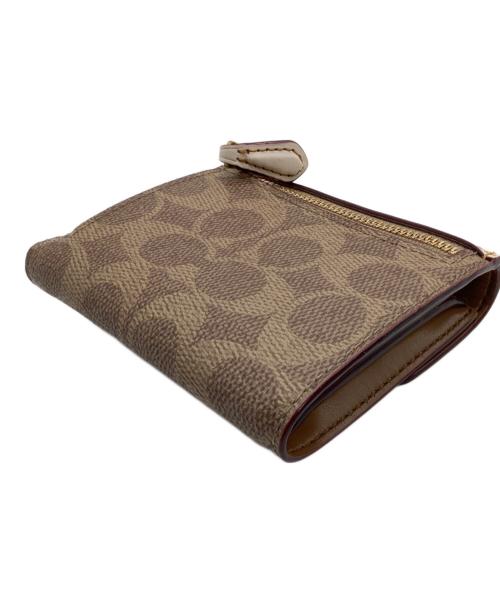 COACH（コーチ）COACH (コーチ) 2つ折り財布 ホワイト×ベージュの古着・服飾アイテム