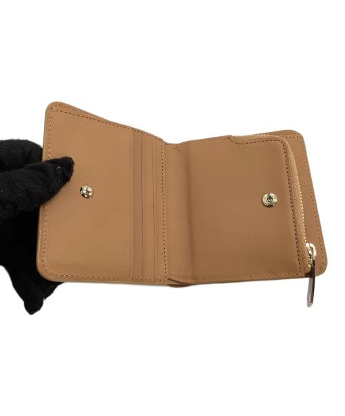 PAUL SMITH（ポールスミス）Paul Smith (ポールスミス) 2つ折り財布　バニーエンボス ベージュの古着・服飾アイテム