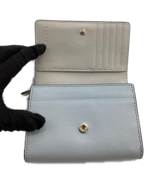 FURLA（フルラ）FURLA (フルラ) 2つ折り財布 カメリア ブルーの古着・服飾アイテム
