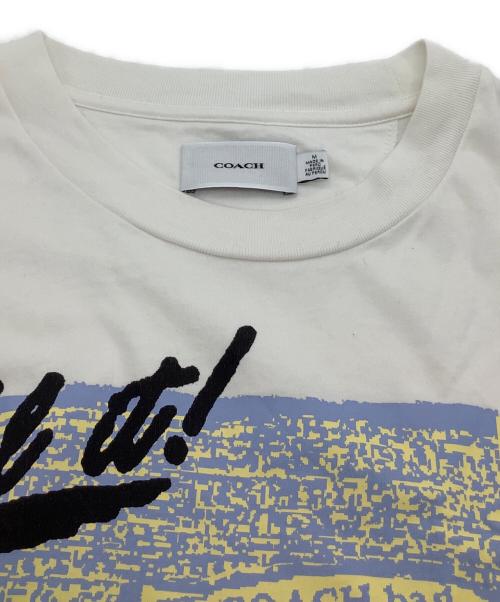 COACH（コーチ）COACH (コーチ) リラックスドグラフィックTシャツ ホワイト サイズ:Mの古着・服飾アイテム
