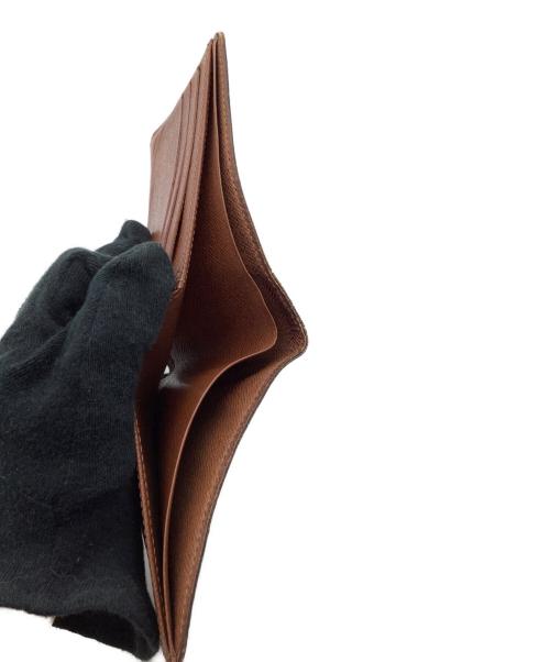 LOUIS VUITTON（ルイ ヴィトン）LOUIS VUITTON (ルイ ヴィトン) 2つ折り財布　モノグラム　ポルトフォイユ ミュルティプル ブラウンの古着・服飾アイテム