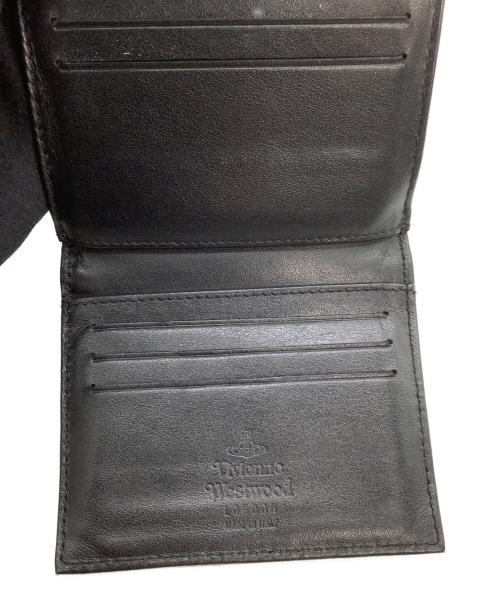 Vivienne Westwood（ヴィヴィアンウエストウッド）Vivienne Westwood (ヴィヴィアンウエストウッド) コンパクトウォレット　DOT SMALL DOUBLE FLAP ブラックの古着・服飾アイテム