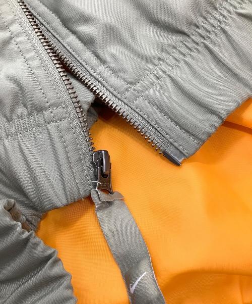 NIKE（ナイキ）NIKE (ナイキ) 中綿ブルゾン　SOLO スウッシュ ボンバー ジャケット カーキ サイズ:XXLの古着・服飾アイテム