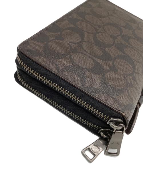 COACH（コーチ）COACH (コーチ) セカンドバッグ　シグネチャー　	ダブル ジップ トラベル オーガナイザー　 ブラウンの古着・服飾アイテム
