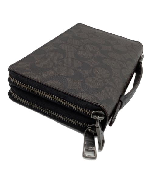COACH（コーチ）COACH (コーチ) セカンドバッグ　シグネチャー　	ダブル ジップ トラベル オーガナイザー　 ブラウンの古着・服飾アイテム