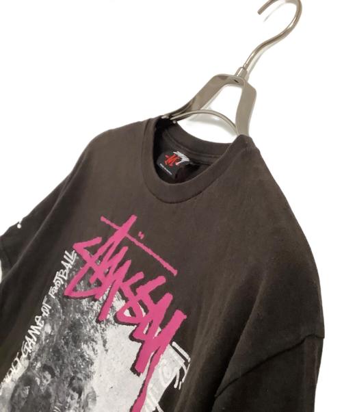 stussy（ステューシー）stussy (ステューシー) 半袖Tシャツ IT'S JUST A FRIENDLY GAME OF FOOTBALL ブラック サイズ:Mの古着・服飾アイテム