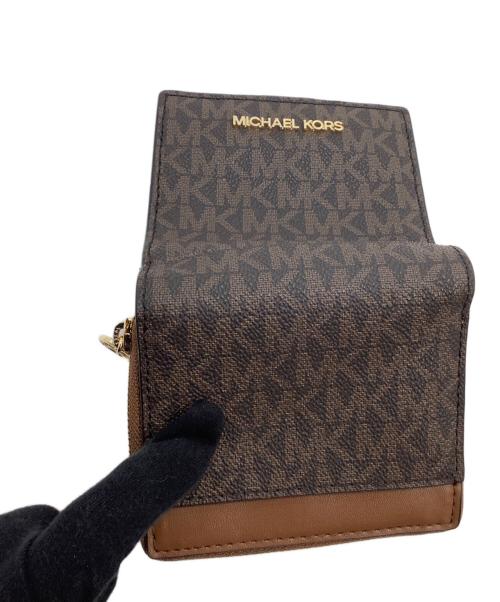 MICHAEL KORS（マイケルコース）MICHAEL KORS (マイケルコース) 2つ折り財布 ブラウンの古着・服飾アイテム