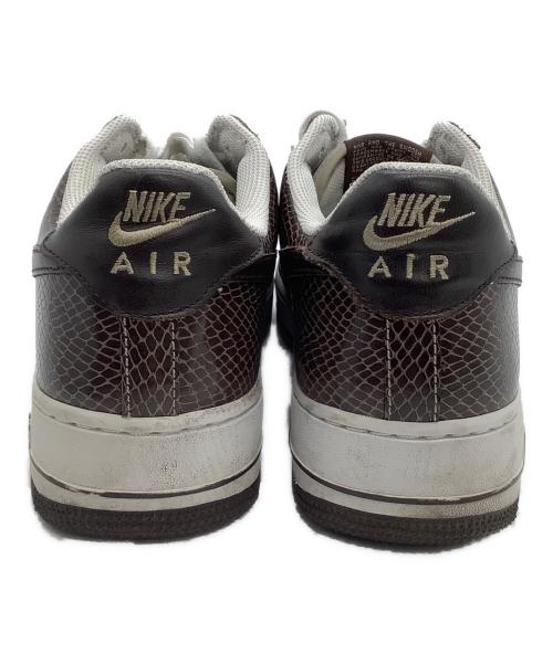 NIKE（ナイキ）NIKE (ナイキ) ローカットスニーカー　Nike AIR FORCE 1 茶蛇 ホワイト×ブラウン サイズ:27の古着・服飾アイテム