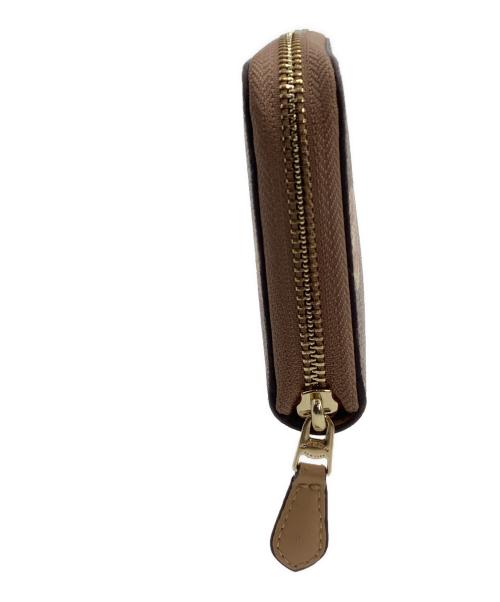 COACH（コーチ）COACH (コーチ) ラウンドファスナー財布 花柄 ブラウンの古着・服飾アイテム