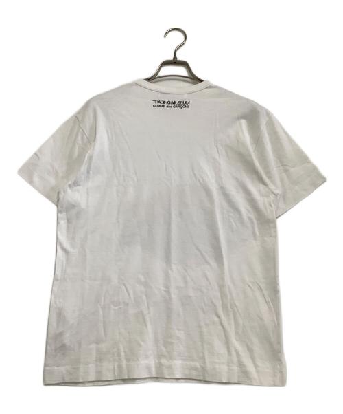 TRADING MUSEUM COMME des GARCONS（トレーディングミュージアムコムデギャルソン）TRADING MUSEUM COMME des GARCONS (トレーディングミュージアムコムデギャルソン) 半袖Tシャツ ホワイト×カーキ サイズ:Lの古着・服飾アイテム