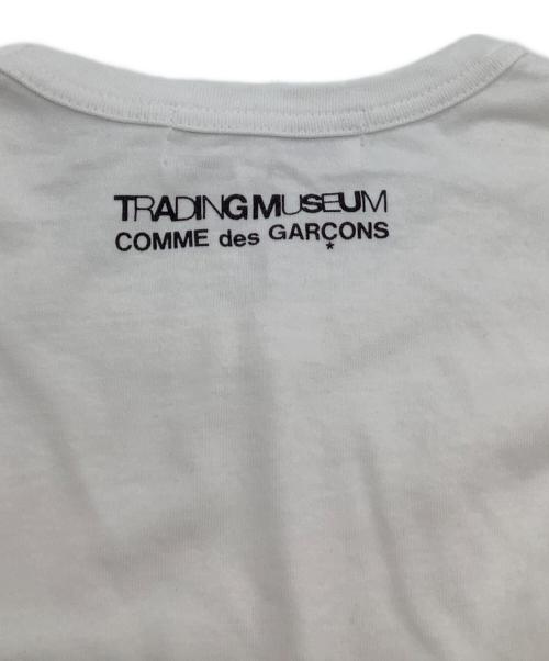 TRADING MUSEUM COMME des GARCONS（トレーディングミュージアムコムデギャルソン）TRADING MUSEUM COMME des GARCONS (トレーディングミュージアムコムデギャルソン) 半袖Tシャツ ホワイト×カーキ サイズ:Lの古着・服飾アイテム