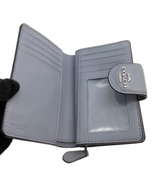 COACH（コーチ）COACH (コーチ) 2つ折り財布 シグネチャー スカイブルーの古着・服飾アイテム
