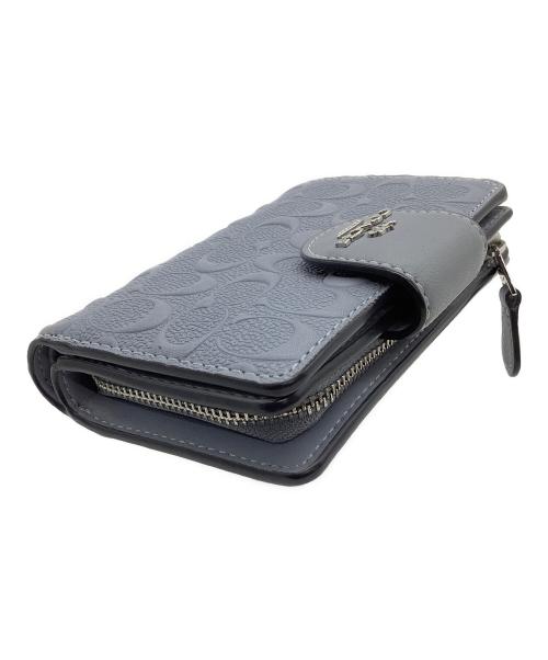 COACH（コーチ）COACH (コーチ) 2つ折り財布 シグネチャー スカイブルーの古着・服飾アイテム