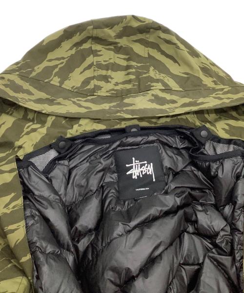 stussy（ステューシー）stussy (ステューシー) nano・universe (ナノ・ユニバース) ダウンジャケット　カモフラージュ柄 オリーブ サイズ:Sの古着・服飾アイテム
