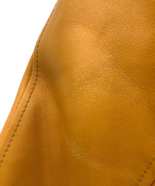 McCOY SPORTSWEAR（マッコイ スポーツウエア）McCOY SPORTSWEAR (マッコイ スポーツウエア) スタジャン レッド×イエロー サイズ:S(34)の古着・服飾アイテム