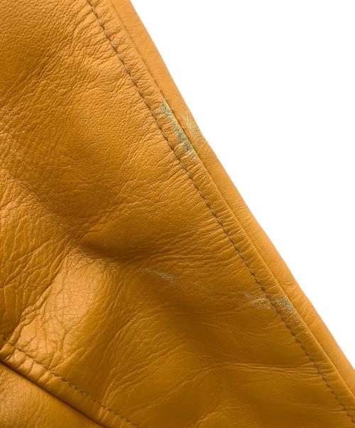 McCOY SPORTSWEAR（マッコイ スポーツウエア）McCOY SPORTSWEAR (マッコイ スポーツウエア) スタジャン レッド×イエロー サイズ:S(34)の古着・服飾アイテム