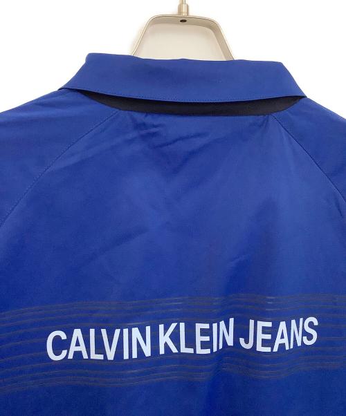 Calvin Klein Jeans（カルバンクラインジーンズ）Calvin Klein Jeans (カルバンクラインジーンズ) リバーシブルブルゾン ブルー×ネイビー サイズ:Mの古着・服飾アイテム