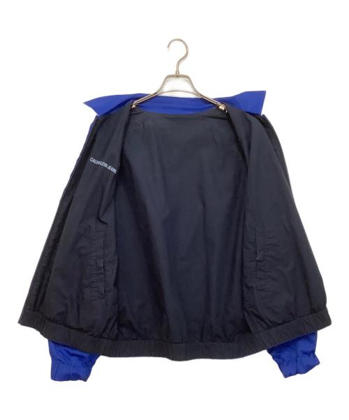 Calvin Klein Jeans（カルバンクラインジーンズ）Calvin Klein Jeans (カルバンクラインジーンズ) リバーシブルブルゾン ブルー×ネイビー サイズ:Mの古着・服飾アイテム