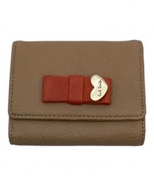 PAUL SMITH（ポールスミス）の古着「3つ折り財布」｜ベージュ×オレンジ