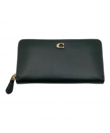 COACH（コーチ）の古着「ラウンドファスナー財布」｜グリーン