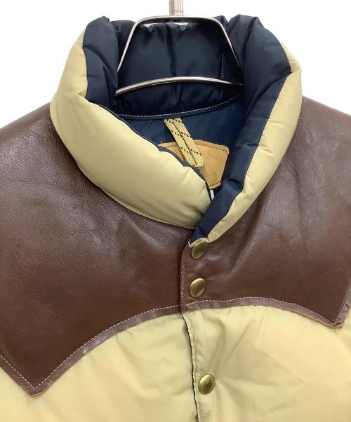 RockyMountainFeatherBed（ロッキーマウンテンフェザーベッド）RockyMountainFeatherBed (ロッキーマウンテンフェザーベッド) ダウンベスト ベージュ×ブラウン サイズ:38の古着・服飾アイテム