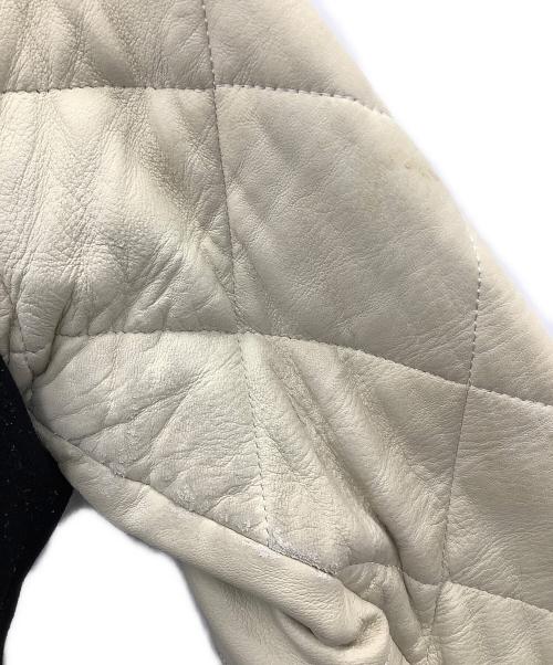 1piu1uguale3（ウノピュウノウグァーレトレ）1piu1uguale3 (ウノピュウノウグァーレトレ) スタジャン ブラック×ベージュ サイズ:Vの古着・服飾アイテム