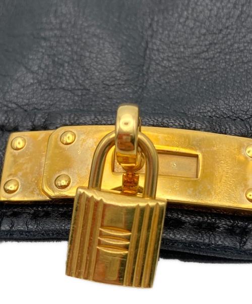 HERMES（エルメス）HERMES (エルメス) ケリー装飾レザーグローブ ブラック×ゴールドの古着・服飾アイテム