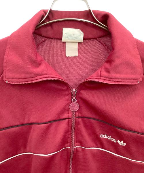 adidas（アディダス）adidas (アディダス) トラックジャケット エンジ サイズ:Mの古着・服飾アイテム