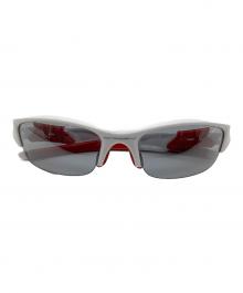 OAKLEY（オークリー）の古着「サングラス」｜ホワイト×レッド