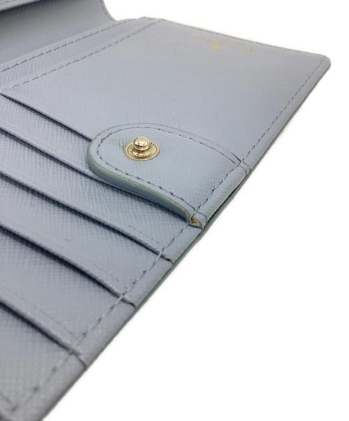 Kate Spade（ケイトスペード）Kate Spade (ケイトスペード) 2つ折り財布 スカイブルーの古着・服飾アイテム