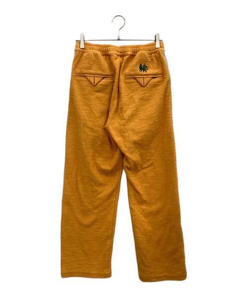 PUMA（プーマ）PUMA (プーマ) SASQUATCHfabrix. (サスクワッチファブリックス) トラックパンツ オレンジ サイズ:Mの古着・服飾アイテム