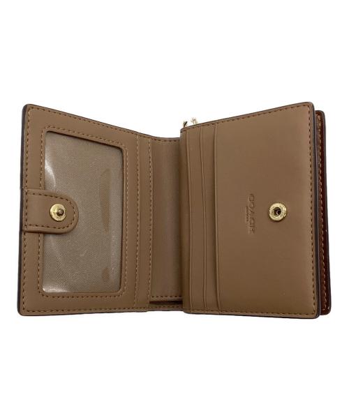COACH（コーチ）COACH (コーチ) スナップウォレット ベージュの古着・服飾アイテム