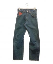 LEVI'S×Coca Cola（リーバイス×コカコーラ）の古着「デニムパンツ」｜インディゴ