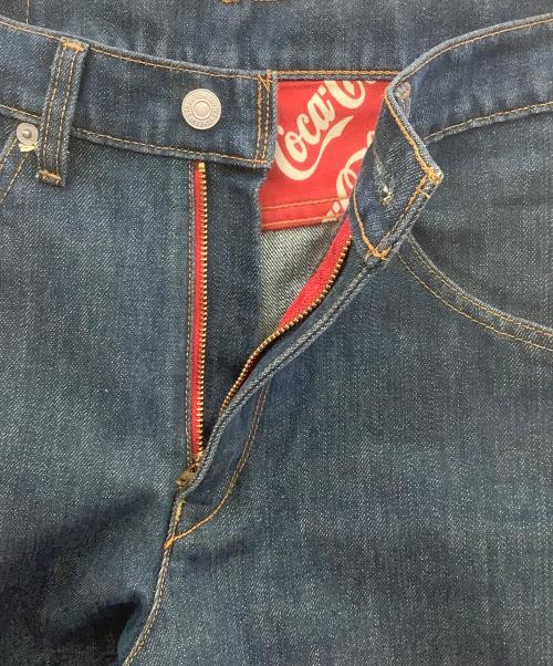 LEVI'S（リーバイス）LEVI'S (リーバイス) Coca Cola (コカコーラ) デニムパンツ インディゴ サイズ:W31L32の古着・服飾アイテム