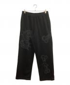 X-LARGEエクストララージ）の古着「ALLOVER PRINTED SWEAT PANTS」｜ブラック