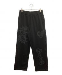 X-LARGE（エクストララージ）の古着「ALLOVER PRINTED SWEAT PANTS」｜ブラック