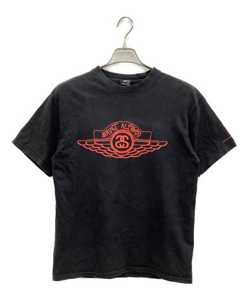 stussy（ステューシー）stussy (ステューシー) SAINT ALFRED (セイント アルフレッド) 半袖カットソー ブラック サイズ:Mの古着・服飾アイテム