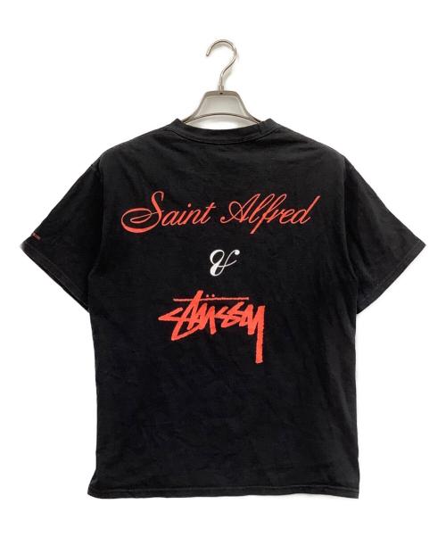 stussy（ステューシー）stussy (ステューシー) SAINT ALFRED (セイント アルフレッド) 半袖カットソー ブラック サイズ:Mの古着・服飾アイテム