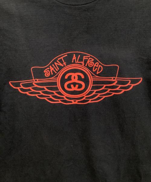 stussy（ステューシー）stussy (ステューシー) SAINT ALFRED (セイント アルフレッド) 半袖カットソー ブラック サイズ:Mの古着・服飾アイテム