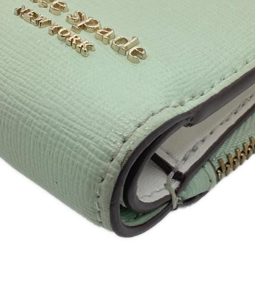 Kate Spade（ケイトスペード）Kate Spade (ケイトスペード) 2つ折り財布 ミントグリーンの古着・服飾アイテム