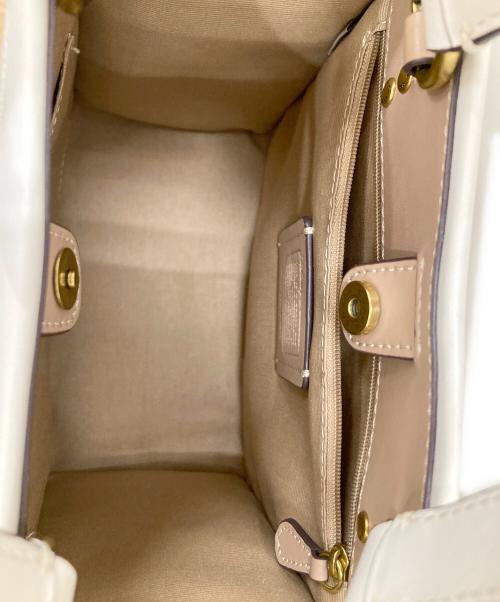 COACH（コーチ）COACH (コーチ) Disney (ディズニー) ショルダーバッグ アイボリーの古着・服飾アイテム