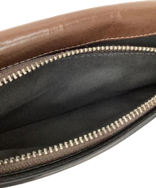 COACH（コーチ）COACH (コーチ) ウォーターバッファローブレスト ポケット ウォレット ブラウンの古着・服飾アイテム