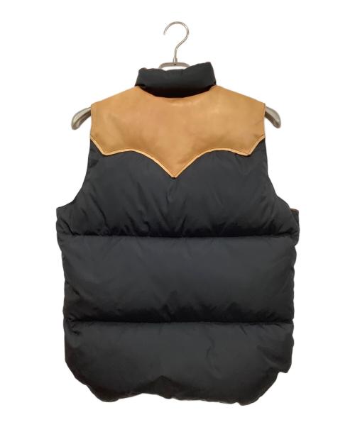RockyMountainFeatherBed（ロッキーマウンテンフェザーベッド）RockyMountainFeatherBed (ロッキーマウンテンフェザーベッド) BEAMS (ビームス) ダウンベスト オレンジ×ブラック サイズ:38の古着・服飾アイテム