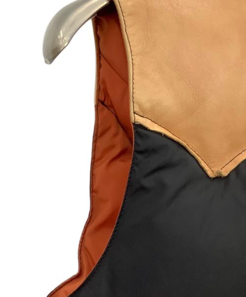RockyMountainFeatherBed（ロッキーマウンテンフェザーベッド）RockyMountainFeatherBed (ロッキーマウンテンフェザーベッド) BEAMS (ビームス) ダウンベスト オレンジ×ブラック サイズ:38の古着・服飾アイテム
