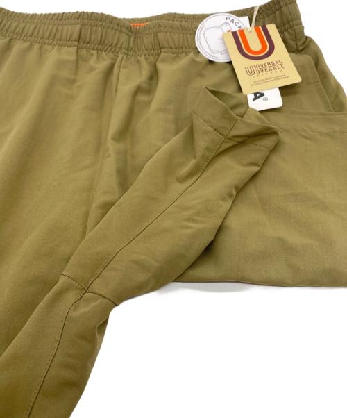 UNIVERSAL OVERALL（ユニバーサルオーバーオール）UNIVERSAL OVERALL (ユニバーサルオーバーオール) ATHLETA (アスレタ) ポケッタブルショーツ ベージュ サイズ:SIZE XL 未使用品の古着・服飾アイテム