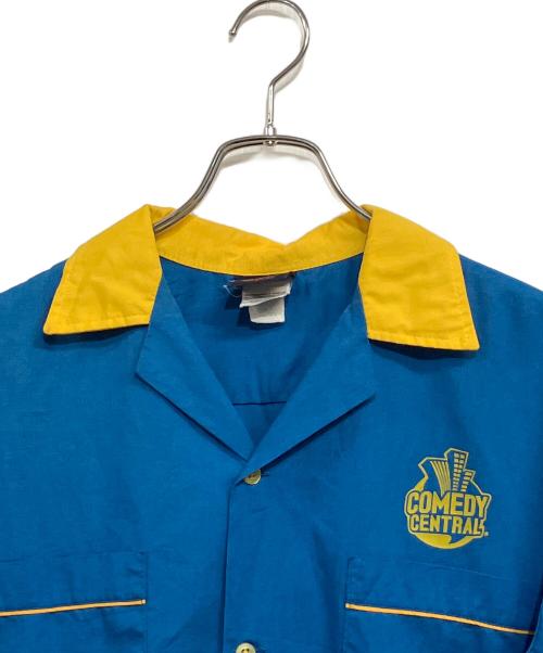 comedy central（コメディセントラル）comedy central (コメディセントラル) Hilton (ヒルトン) 半袖シャツ ブルー×イエロー サイズ:SIZE L (US M)の古着・服飾アイテム