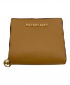 MICHAEL KORSマイケル・コース）の古着「2つ折り財布」｜キャメル