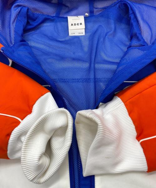 PUMA（プーマ）PUMA (プーマ) ADER error (アーダーエラー) ウインドブレーカー ブルー×オレンジ サイズ:SIZE Mの古着・服飾アイテム
