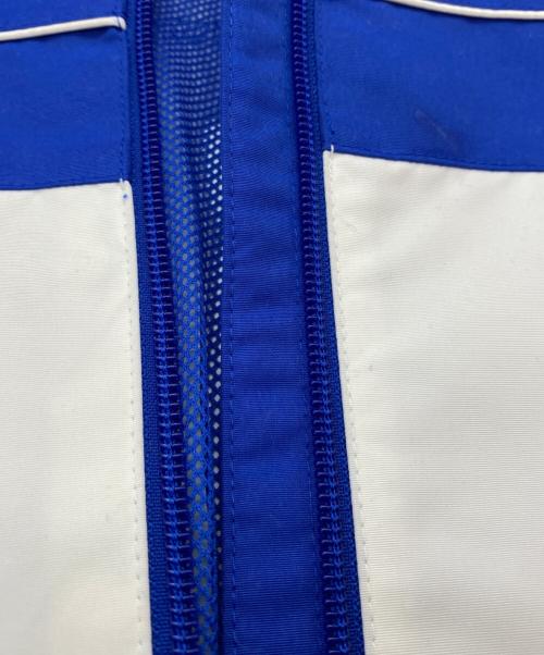 PUMA（プーマ）PUMA (プーマ) ADER error (アーダーエラー) ウインドブレーカー ブルー×オレンジ サイズ:SIZE Mの古着・服飾アイテム