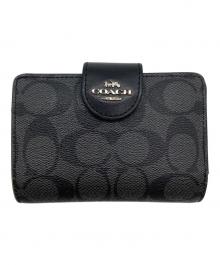 COACH（コーチ）の古着「2つ折り財布」｜ブラック